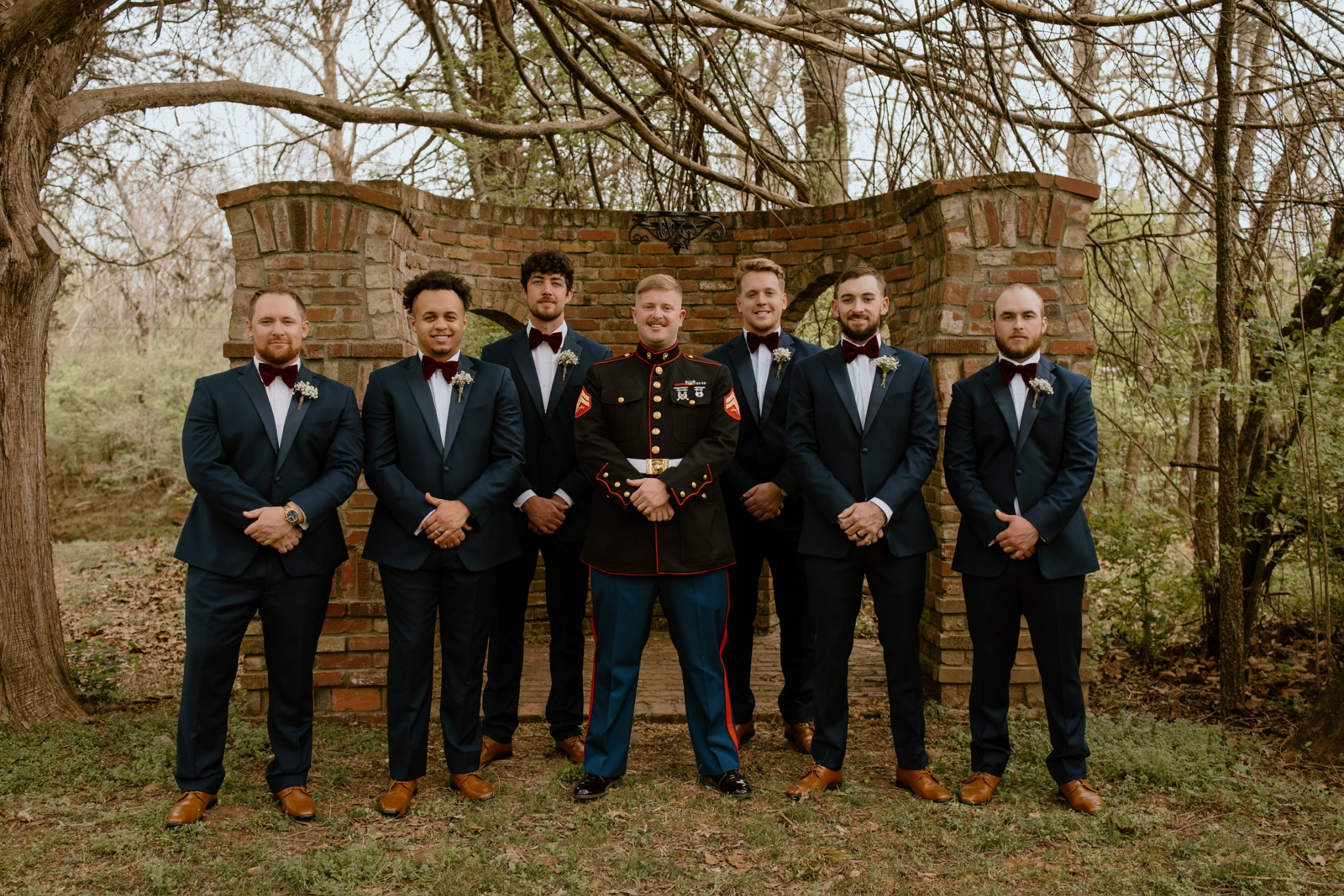 Wedding party photographed beside the Castle at Blue Spring Estate