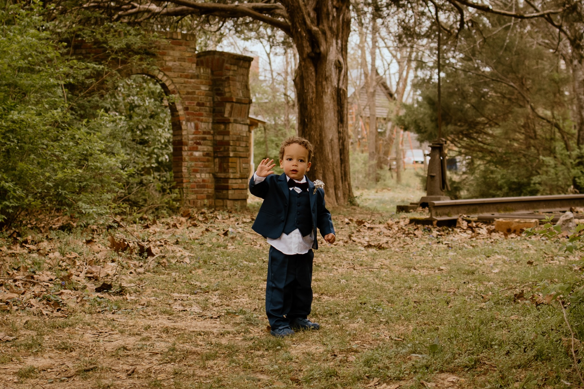 Young child photographed beside the Castle at Blue Spring Estate