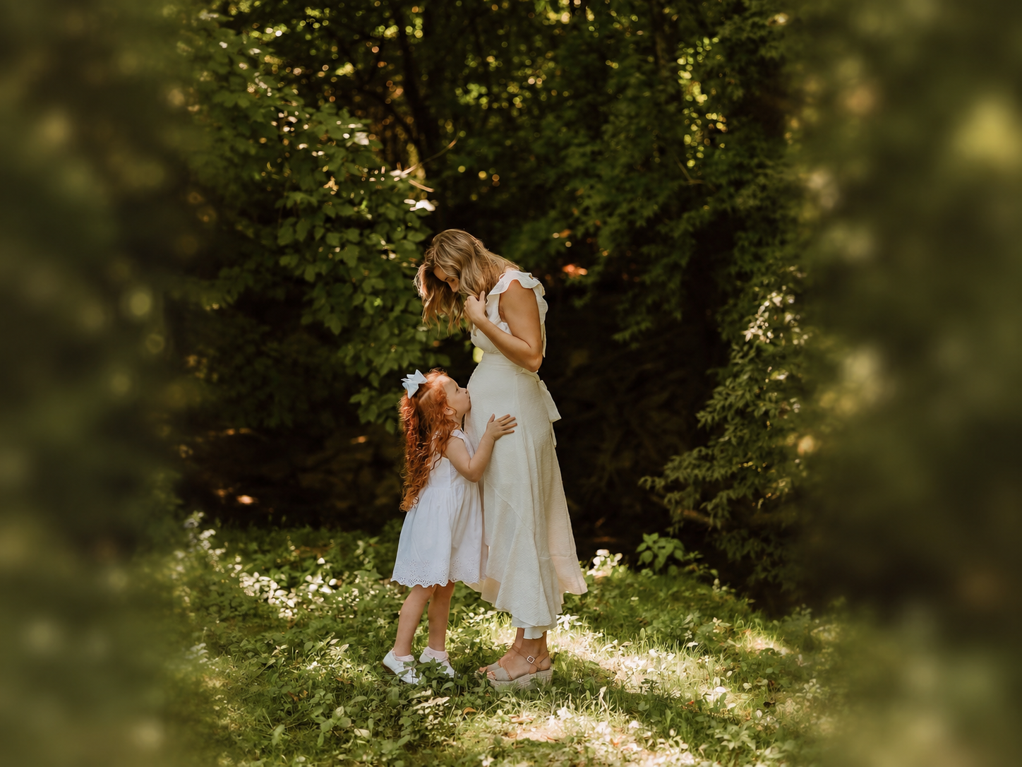 Mother and daughter photographed in the Secret Garden at Blue Spring Estate
